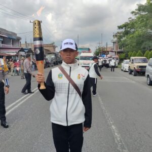 Polres Simalungun Kawal Kirab Api PON XXI Tahun 2024 Aceh-Sumut dengan Lancar dan Meriah