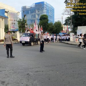 Polres Pematangsiantar Lakukan Pengamanan Gerak Jalan dan Senam Sehat